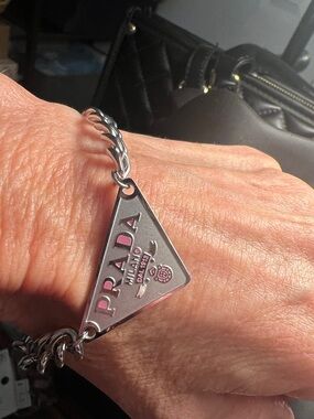 Silver-Tone Triangle Logo Bracelet with Pink Accents